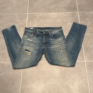 Jack & Jones jeans  - Ett par snygga jeans från Jack & Jones i storlek W31 L30 i modellen slim fit/glenn 