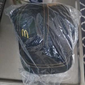 Mcdonalds keps - En svart mcdonalds keps. Aldrig använt.