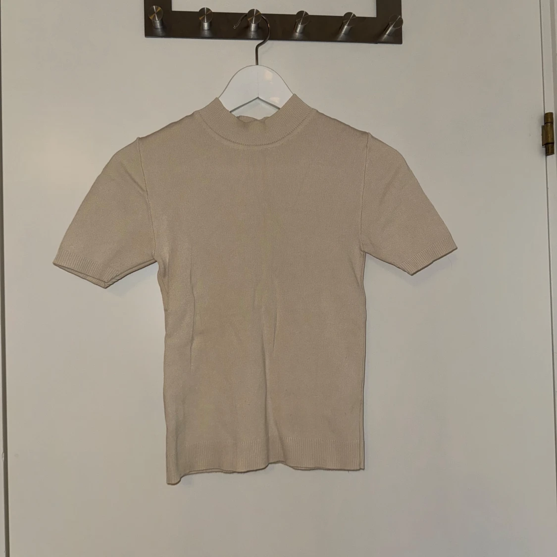 Beige kortärmad polotröja primark