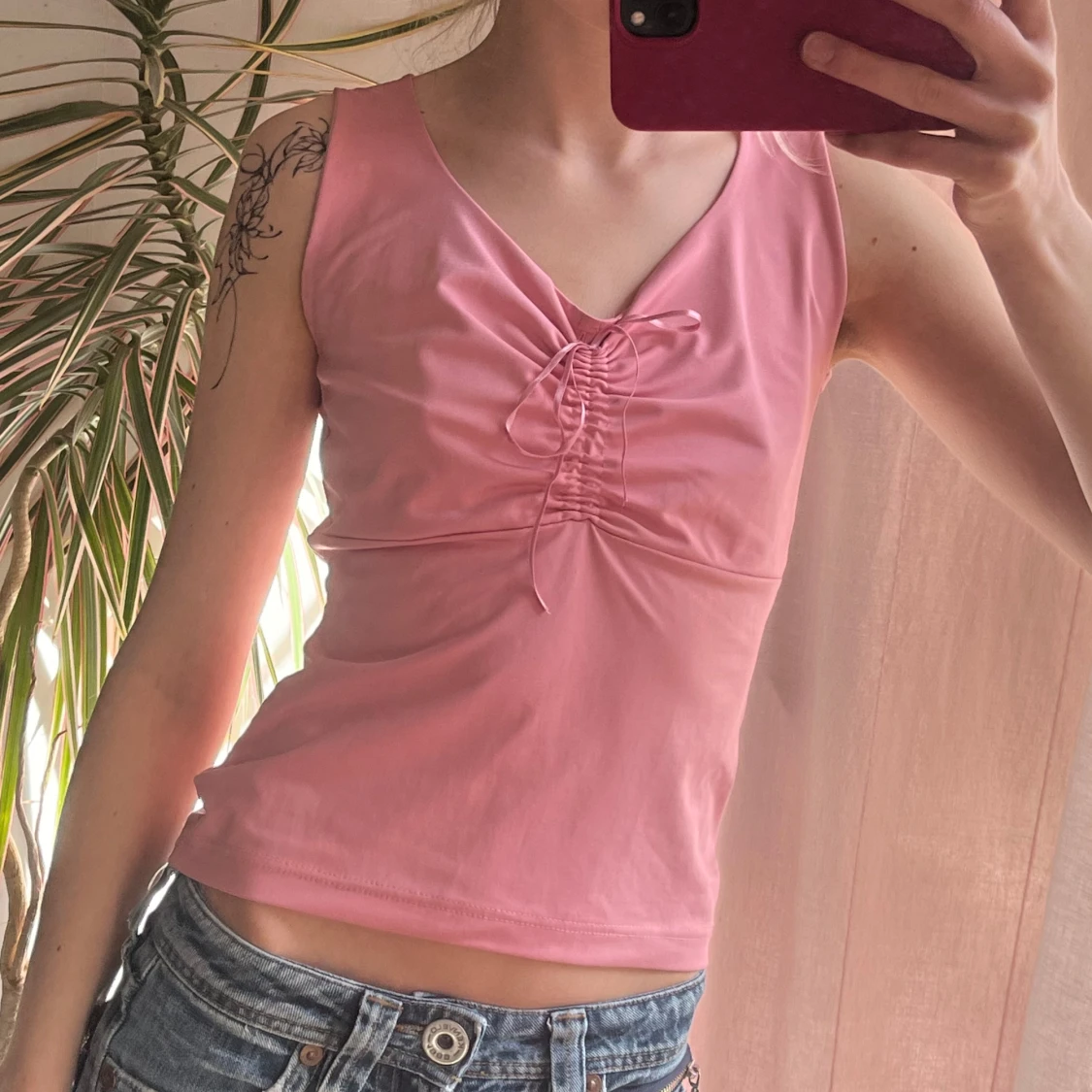 Rosa ärmlös topp med knytning - 1