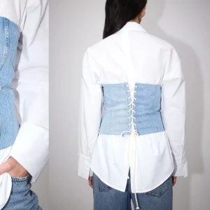 Denimkorsett topp - Denim korsett topp från Gina tricot helt ny med prislapp kvar strl m (egna bilder kan fixas)