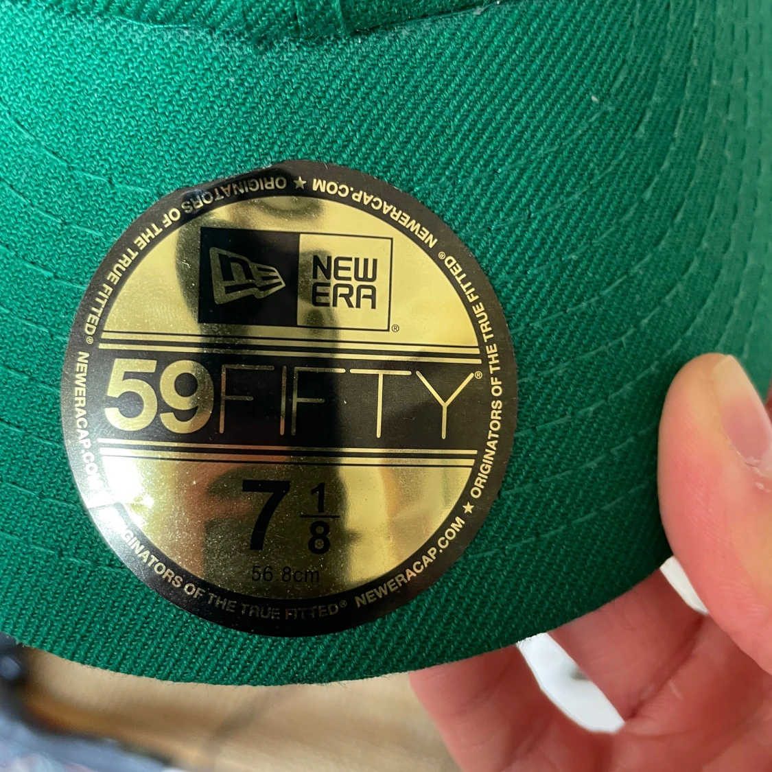 Grön keps från New Era storlek 56,8cm (7 1/8) - 2