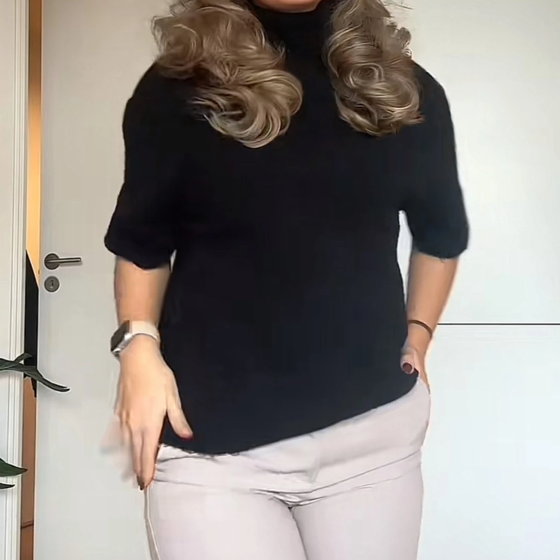 Svart polotröja med kort ärm