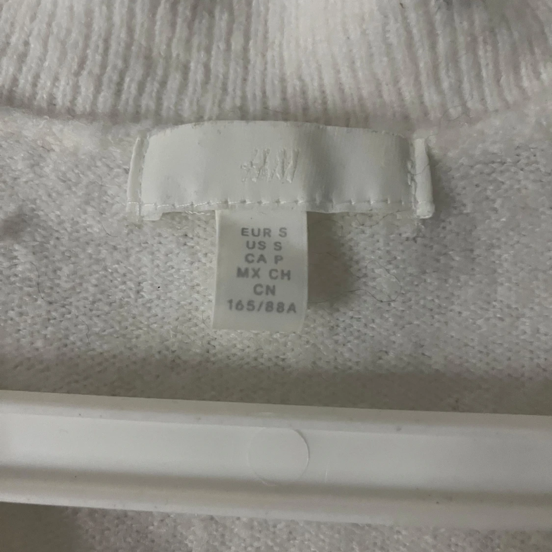 Vit kofta med glittriga knappar H&M - 1