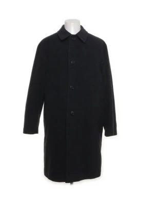 Vintage ullrock från Strellson - intage ullrock från Strellson.   Den är storlek 48 så ungefär s-m.  Den är en stilig mörkgrå som passar till alla outfits!  Har du frågor är det bara att höra av dig! 🤗