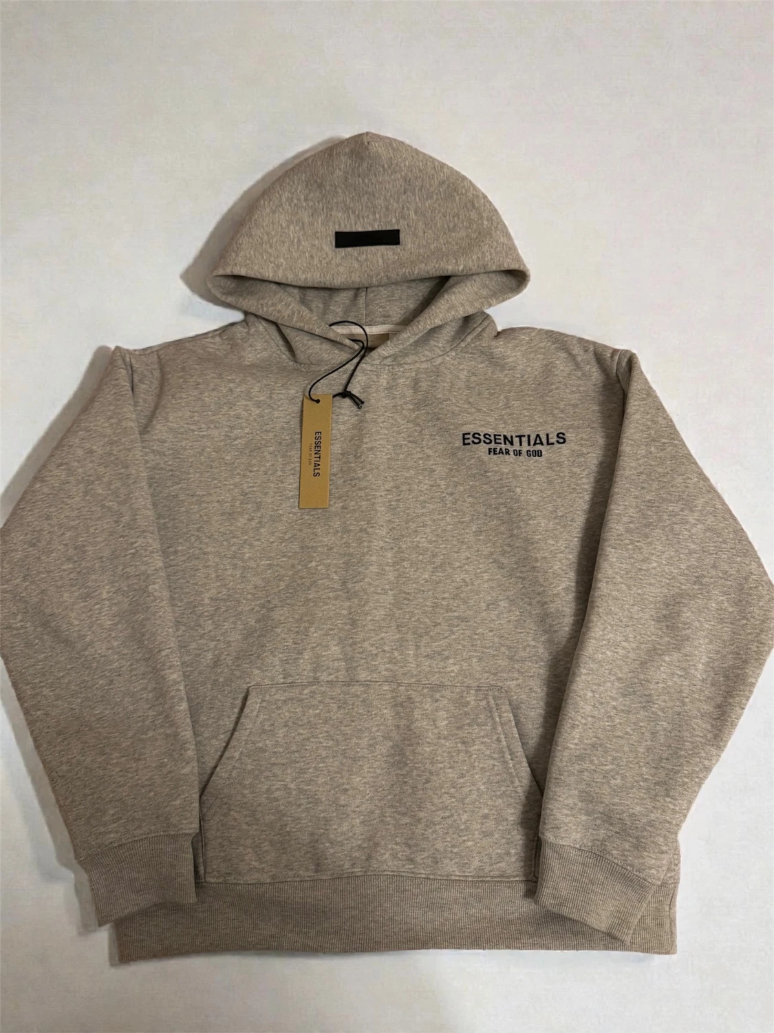 Essentials hoodie med tags