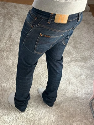 Nudie jeans Grim Tim - Nudie Jeans | skick 9/10 | Storlek 32/34 | Pris - 499kr | Modellen är ca 179cm lång | Hör av dig vid minsta fråga eller fundering!!