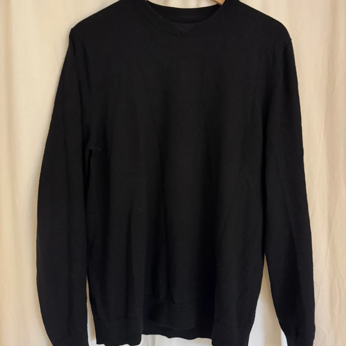 Svart merinoulltröja från These Glory Days