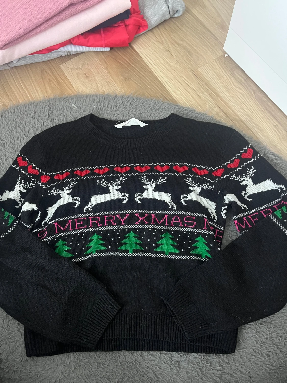 Svart jultröja med renar från H&M