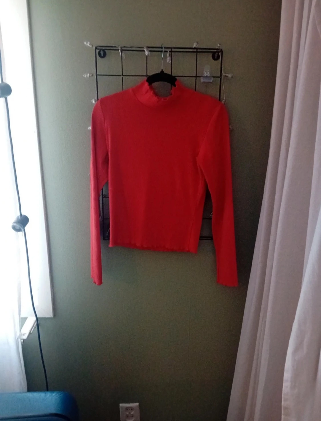 Orange ribbad polotopp med långa ärmar