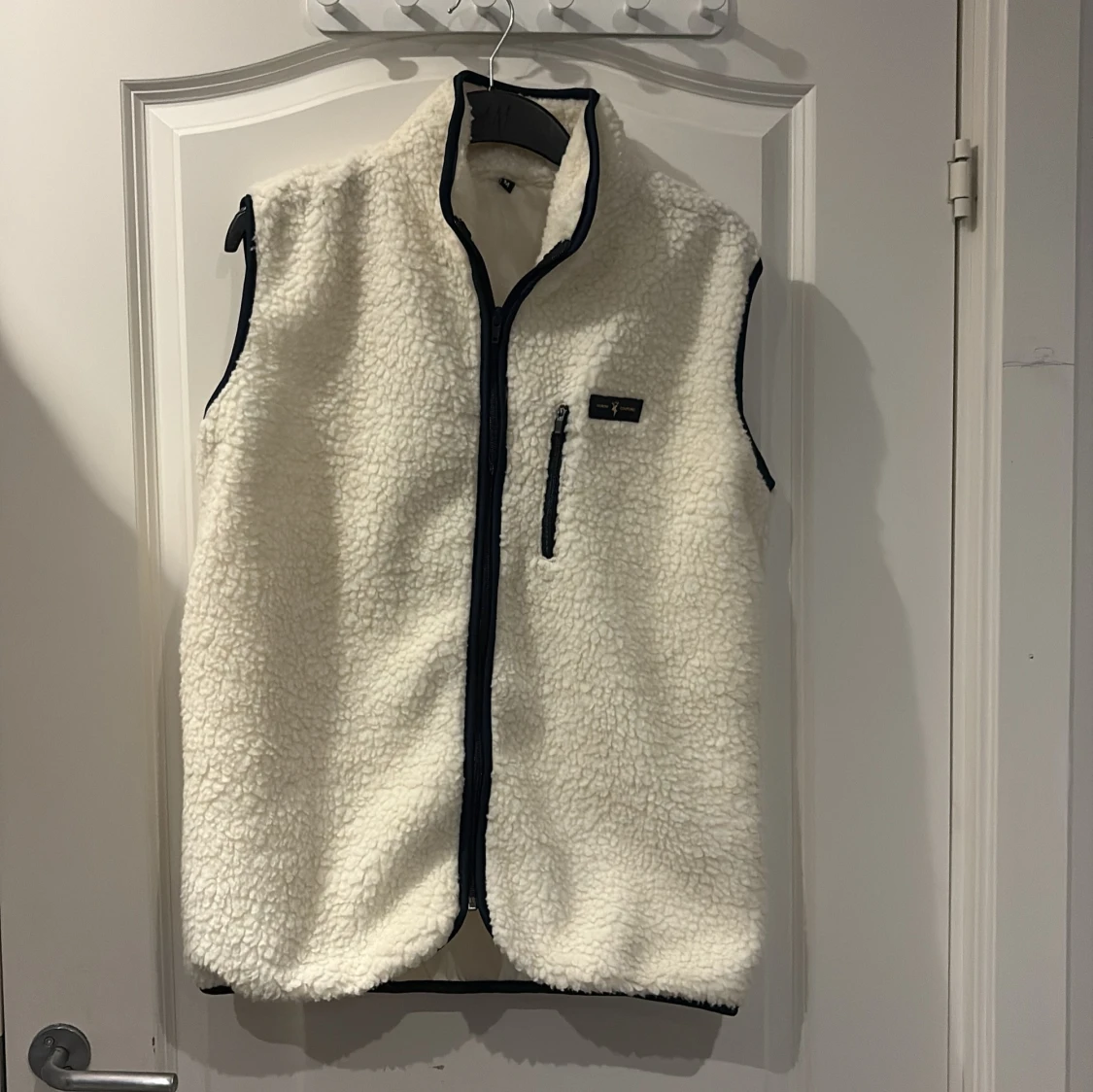 Vit fleeceväst från North Couture