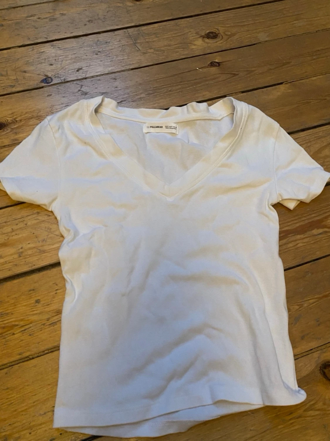 Vit v-ringad t-shirt