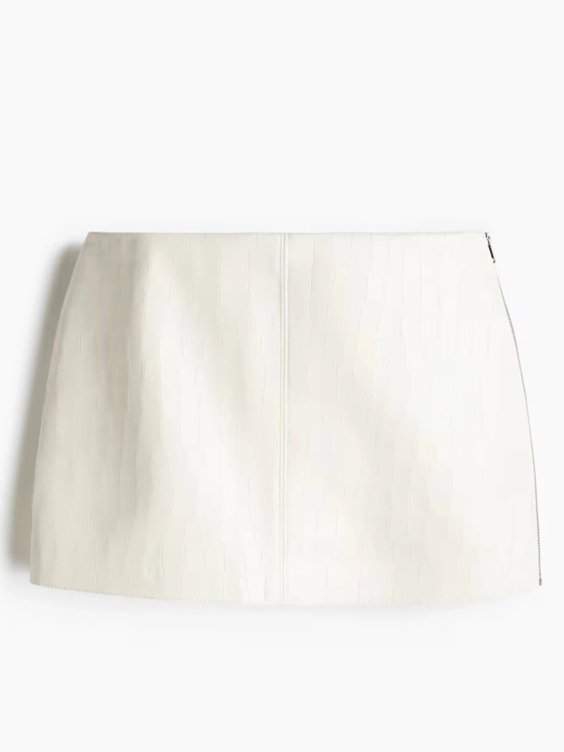 Vit kort kjol i croco-imitation från H&M