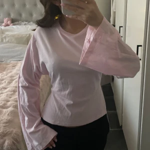 Ljusrosa topp från Nelly  - Använd 1 gång, inga defekter 