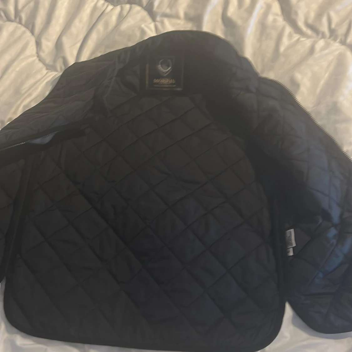 Svart quiltad dunväst från Morris - 1