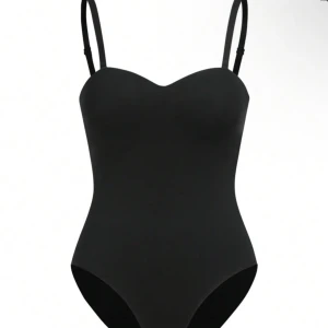 Svart body - Skitsnygg svart body i storlek XS. Aldrig använd! 