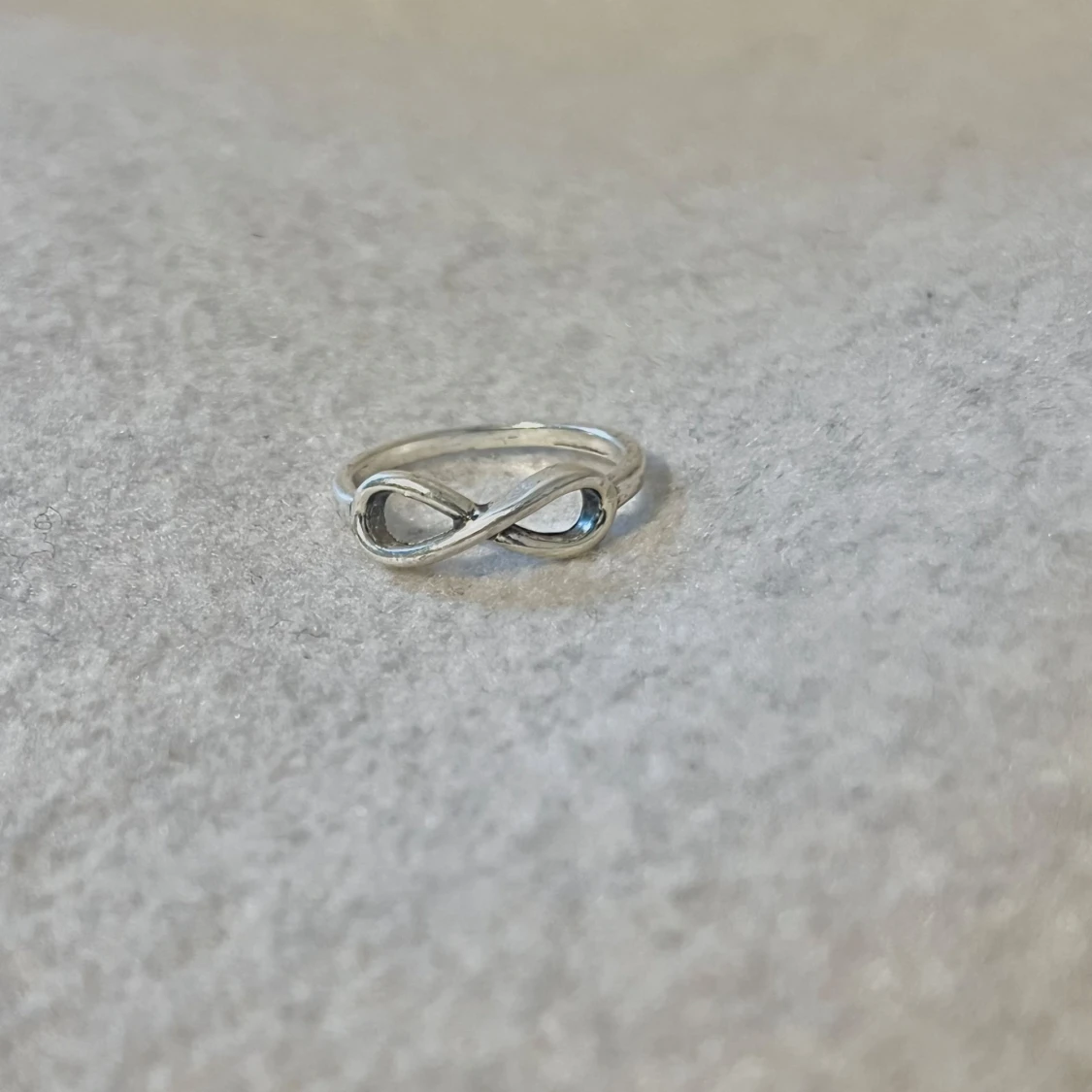 Infinity symbol ring