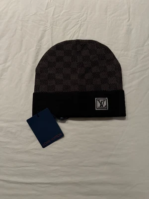  rutig svart mössa - Rutig svart mössa 