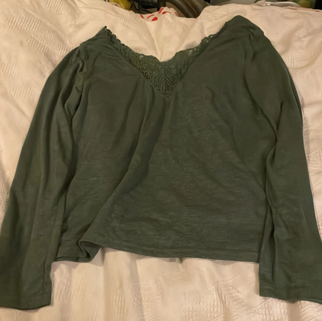 Grön långärmad blus med spets