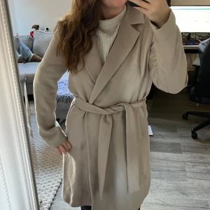 Beige kappa Zara - Kappa från Zara