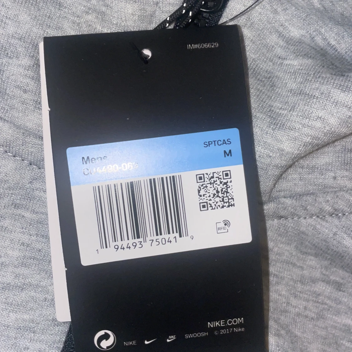 Grå vindjacka från Nike med huva - 2