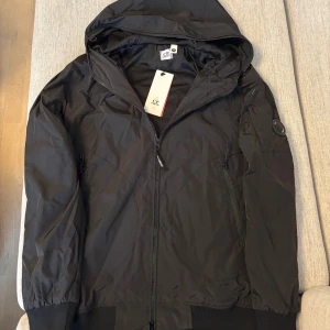Cp jacka svart  - Helt ny med tags 