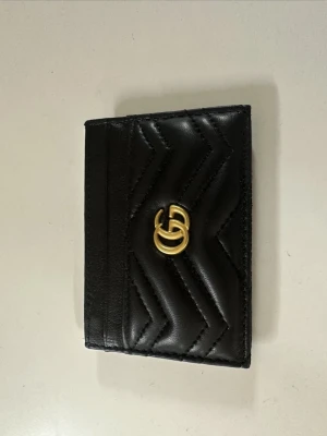 Plånbok / korthållare  - Plånbok / korthållare. Aldrig använd. 