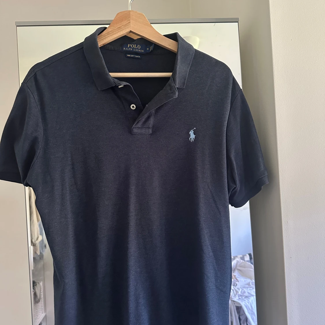 Mörkblå piké från Ralph lauren M