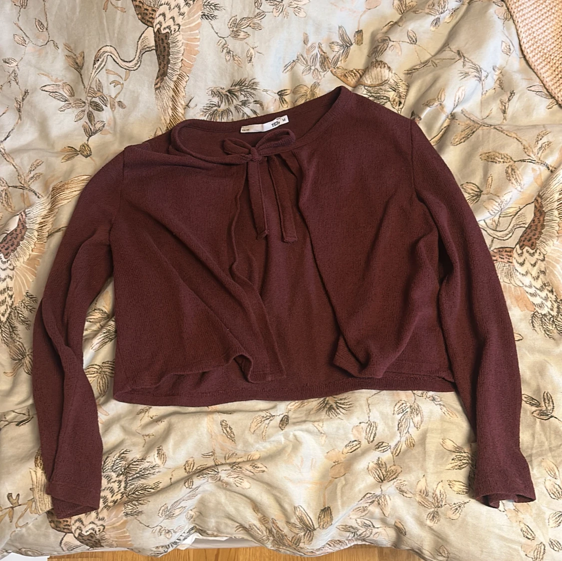 Röd kofta med rosett - 2