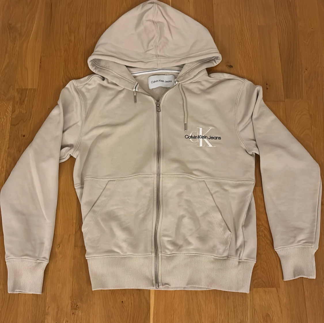 Beige hoodie från Calvin Klein Jeans