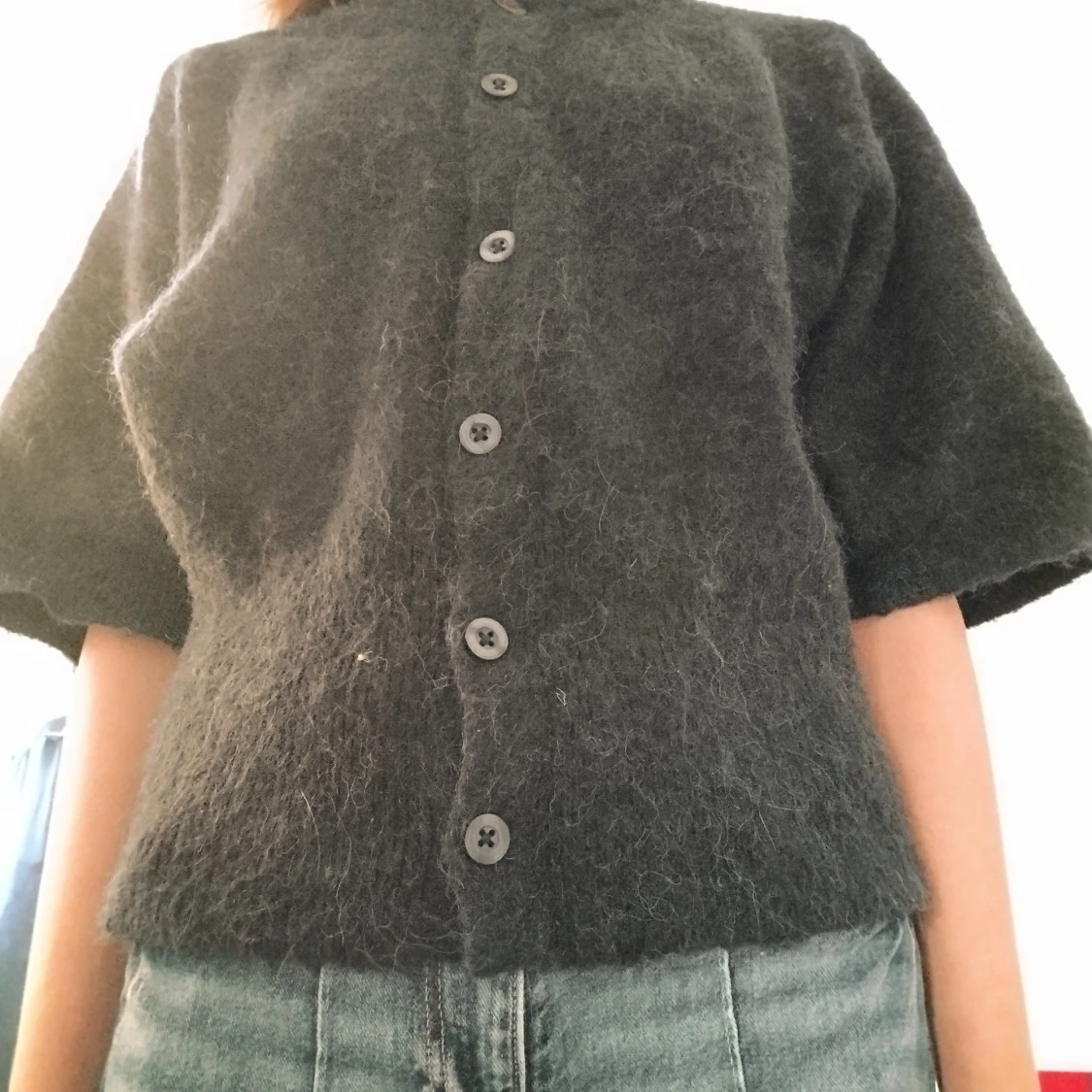 Svart kofta från Gina Tricot