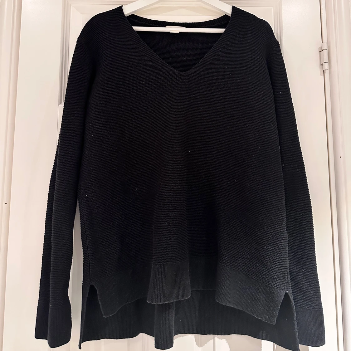 Svart stickad tröja