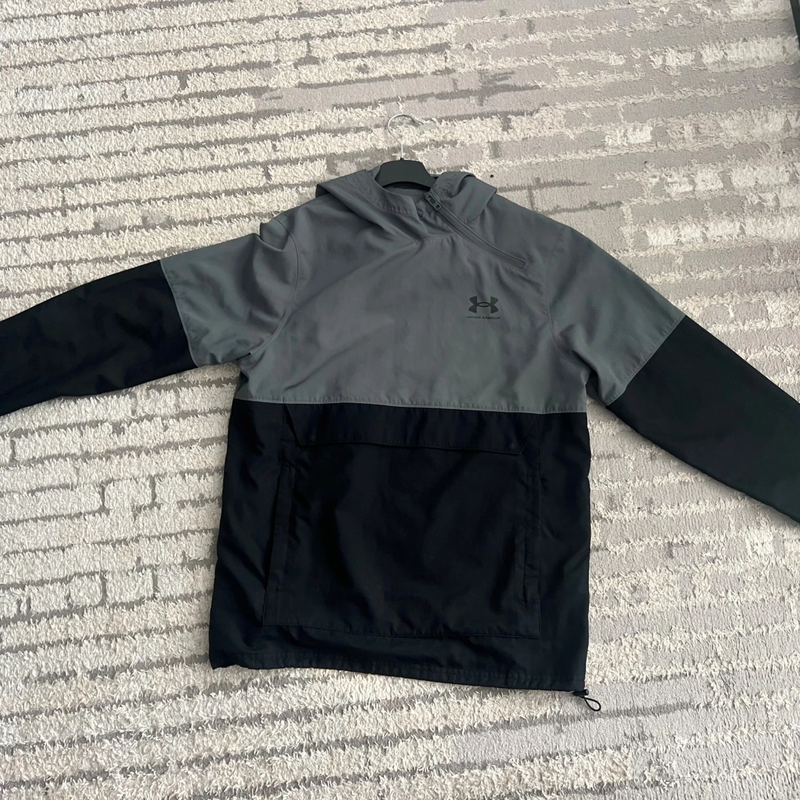 Under armour vindjacka