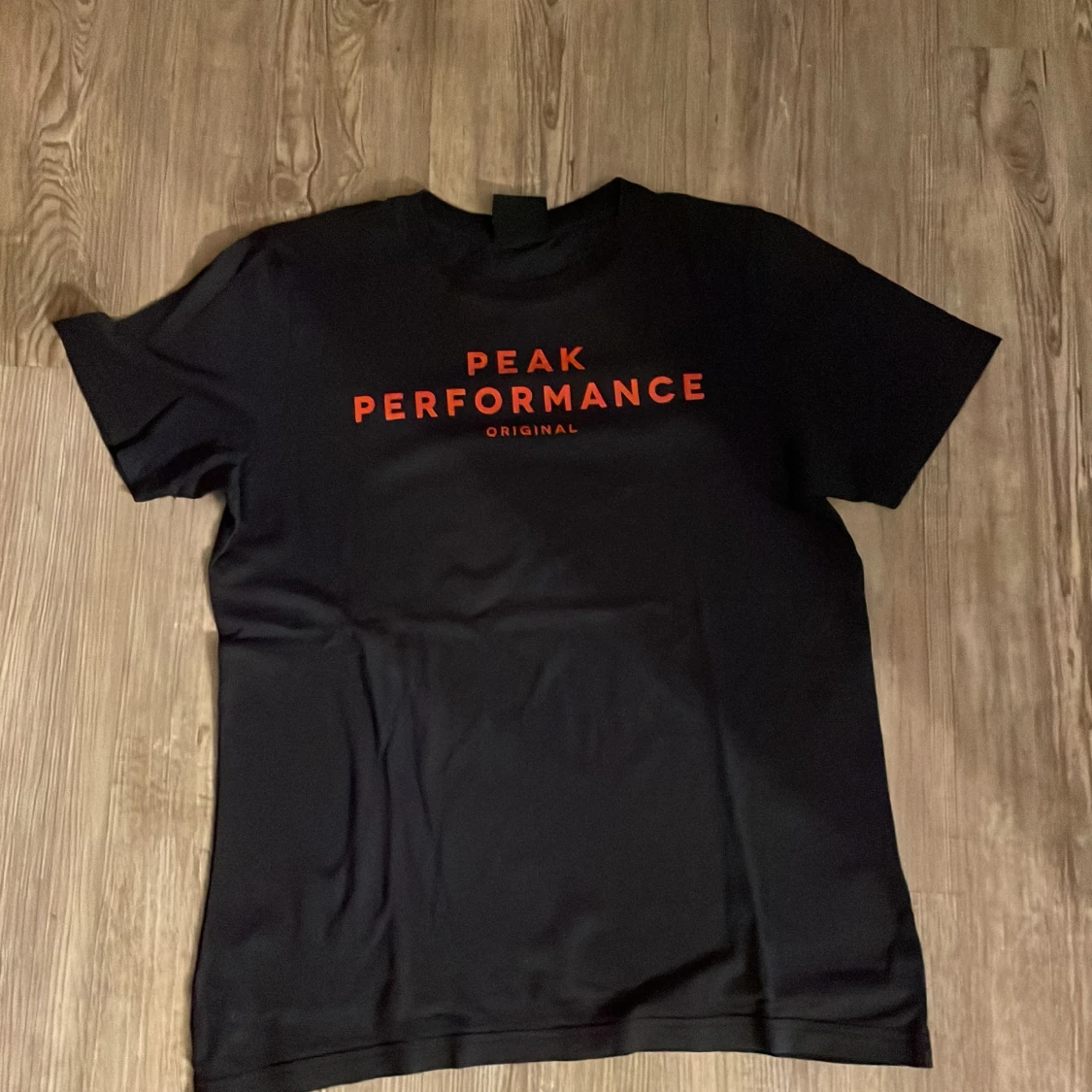 Marin blå Peak Performance t-shirt
