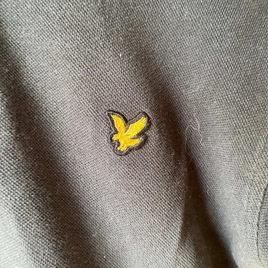 Svart piké från Lyle & Scott, S - 1