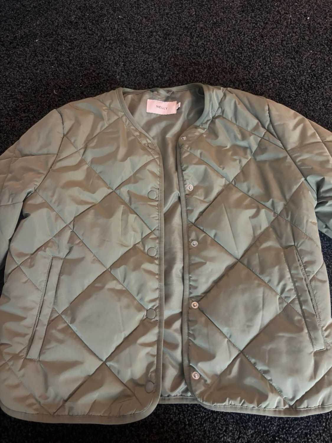 grön jacka från Nelly