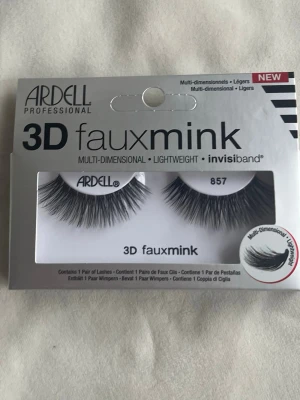 Ardell 3D faux mink lösögonfransar - Säljer ett par Ardell Professional 3D faux mink lösögonfransar, modell 857. Fransarna är svarta, multi-dimensionella och har en lätt känsla med invisiBand för en naturlig look. Perfekt för att ge extra volym och längd till dina fransar.