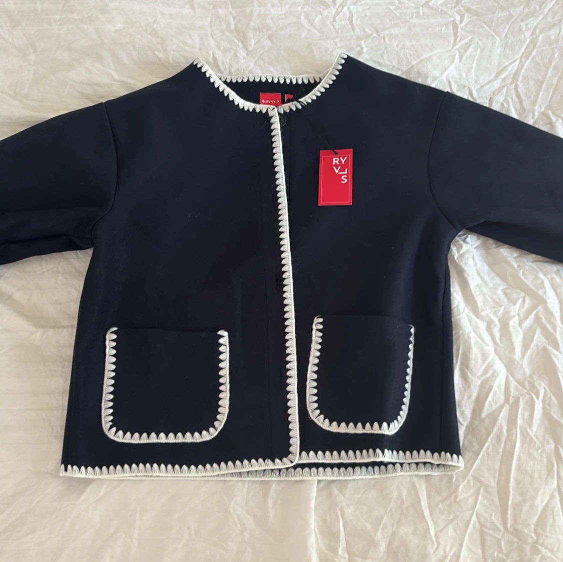Mörkblå cardigan jacka från RYVLS