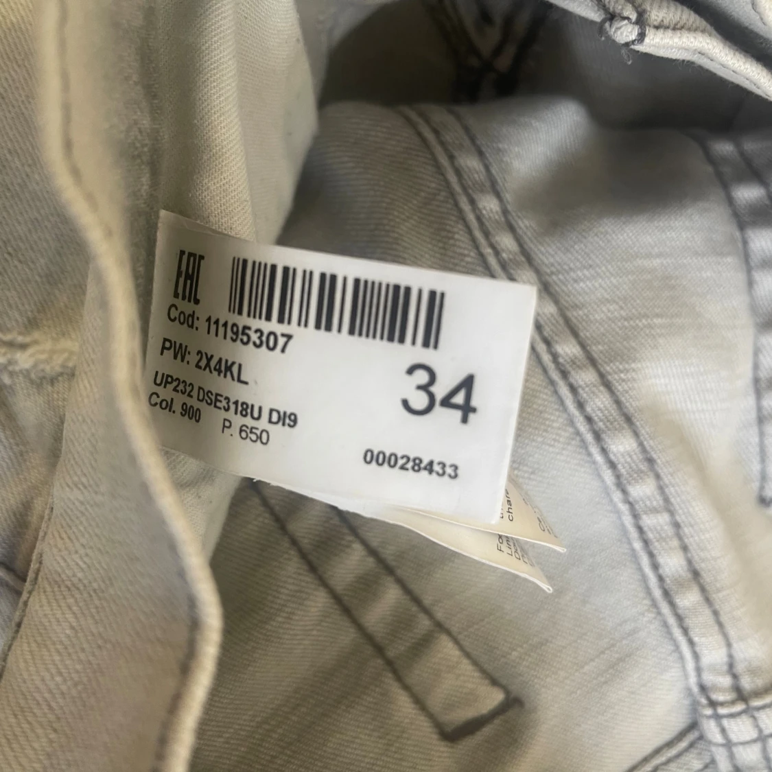 Ljusgrå  jeans från Dondup med slitningar - 3