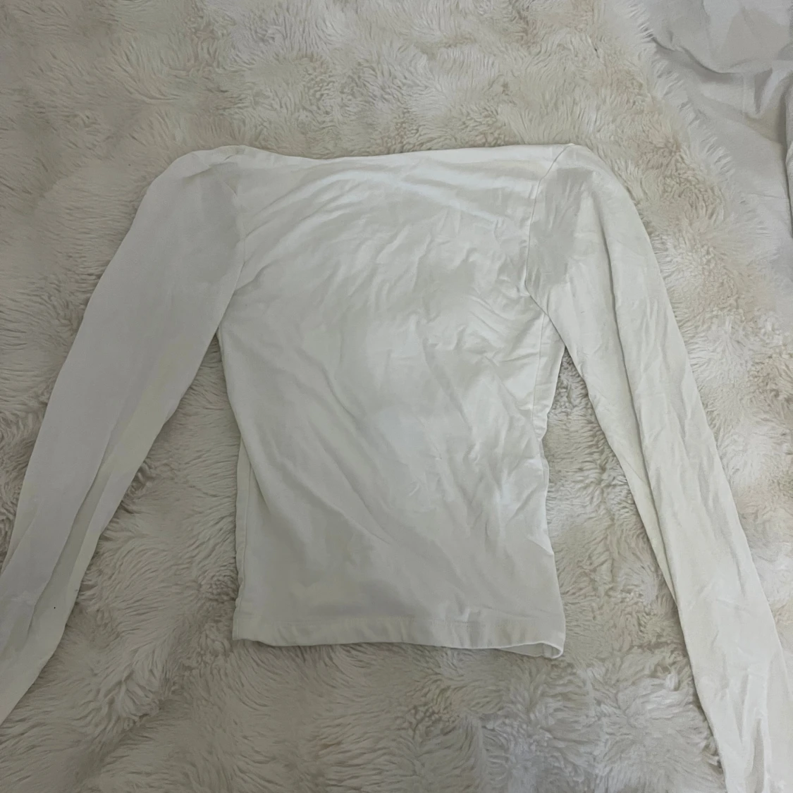 Vit långärmad topp från Gina Tricot