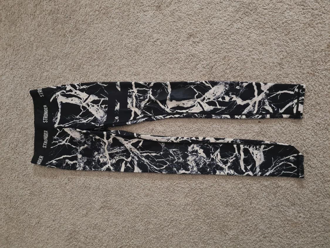 Svarta marmor-mönstrade tights Stronger - 1