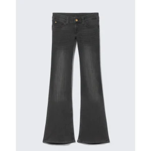 Mörkgrå bootcut jeans - Snygga mörkgrå jeans med bootcut från cheap Monday, enda defekten är att de är lite söndertrampade där nere, kom privat för fler bilder💞