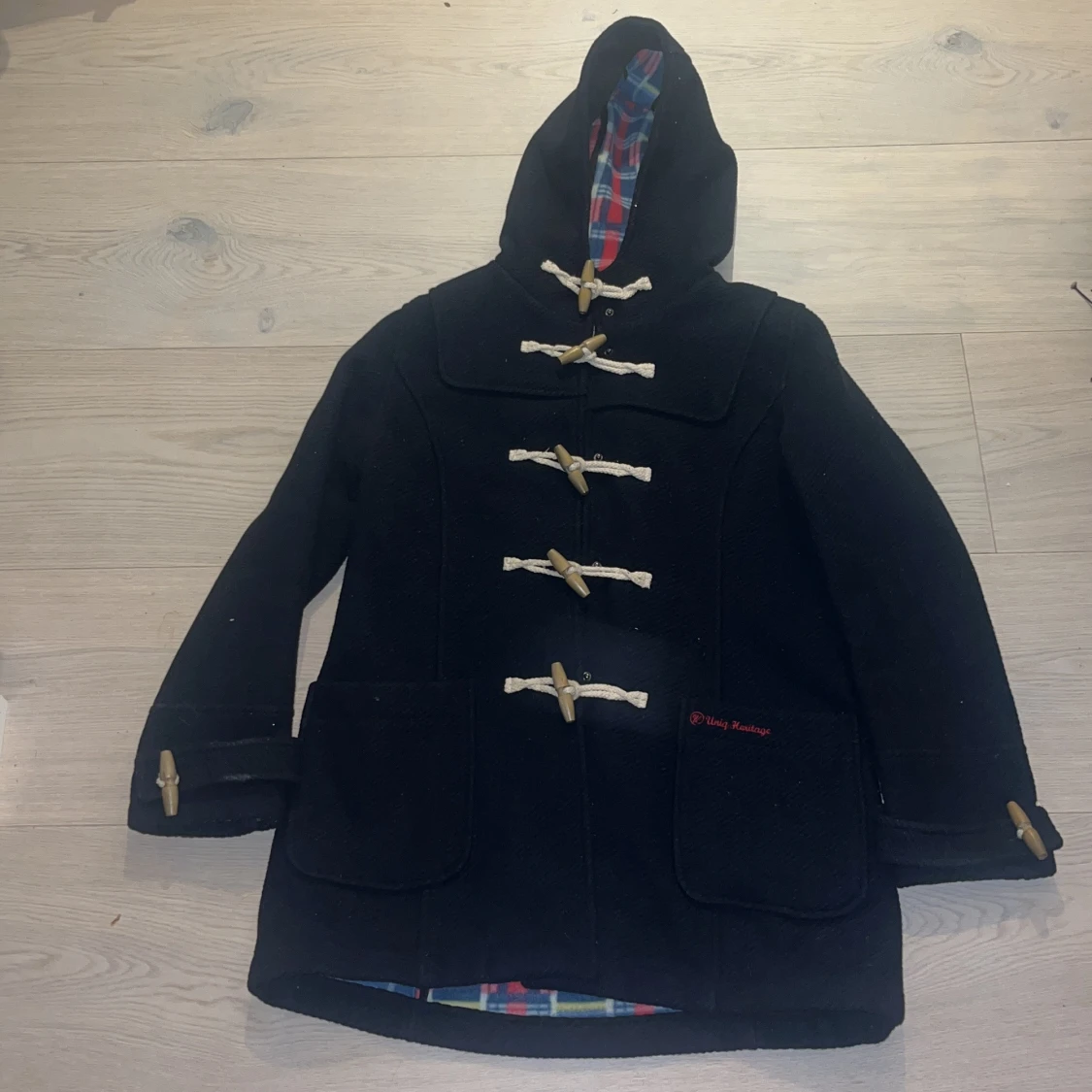 Marinblå duffeljacka från Uniq Outwear