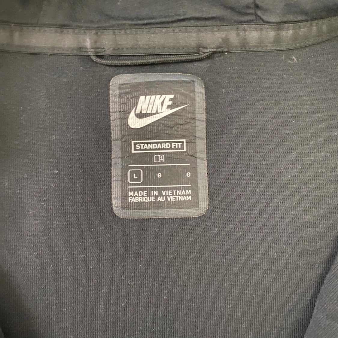 Svart hoodie från Nike med dragkedja - 1