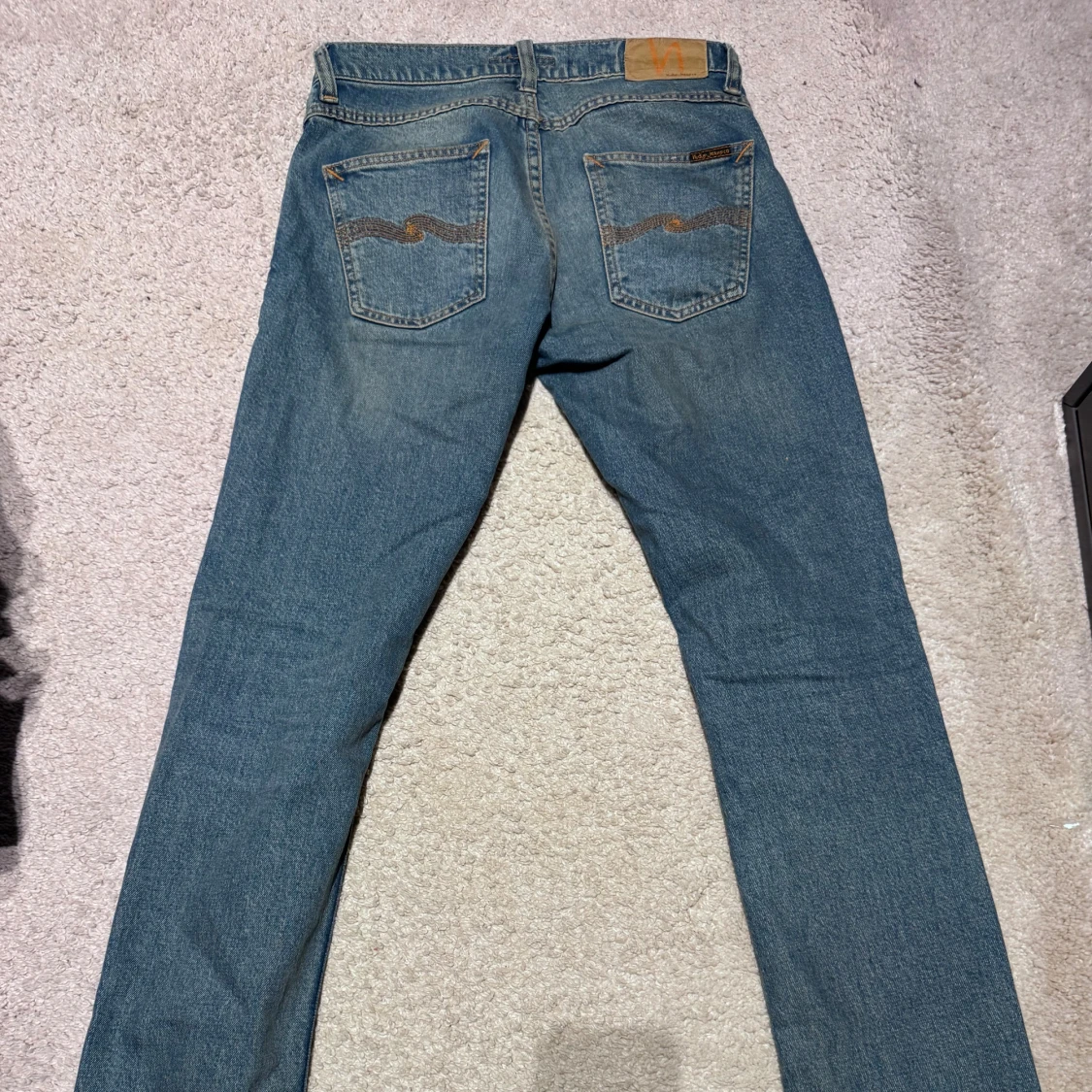 Blå Nudie Jeans 28/32 med raka ben - 1