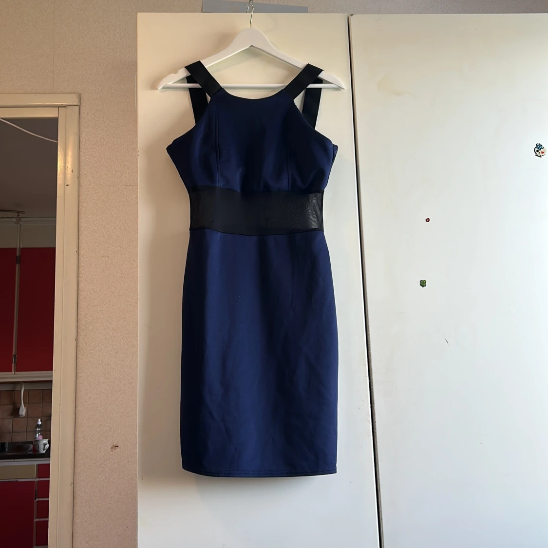 Mörkblå klänning från Zack London