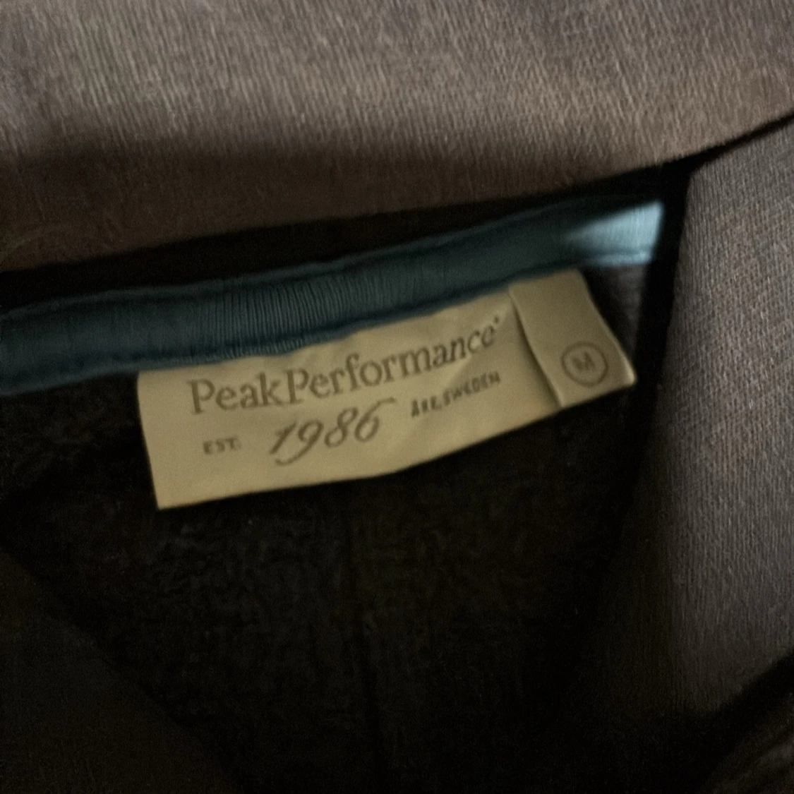 Mörkblå hoodie Peak Performance M - 1