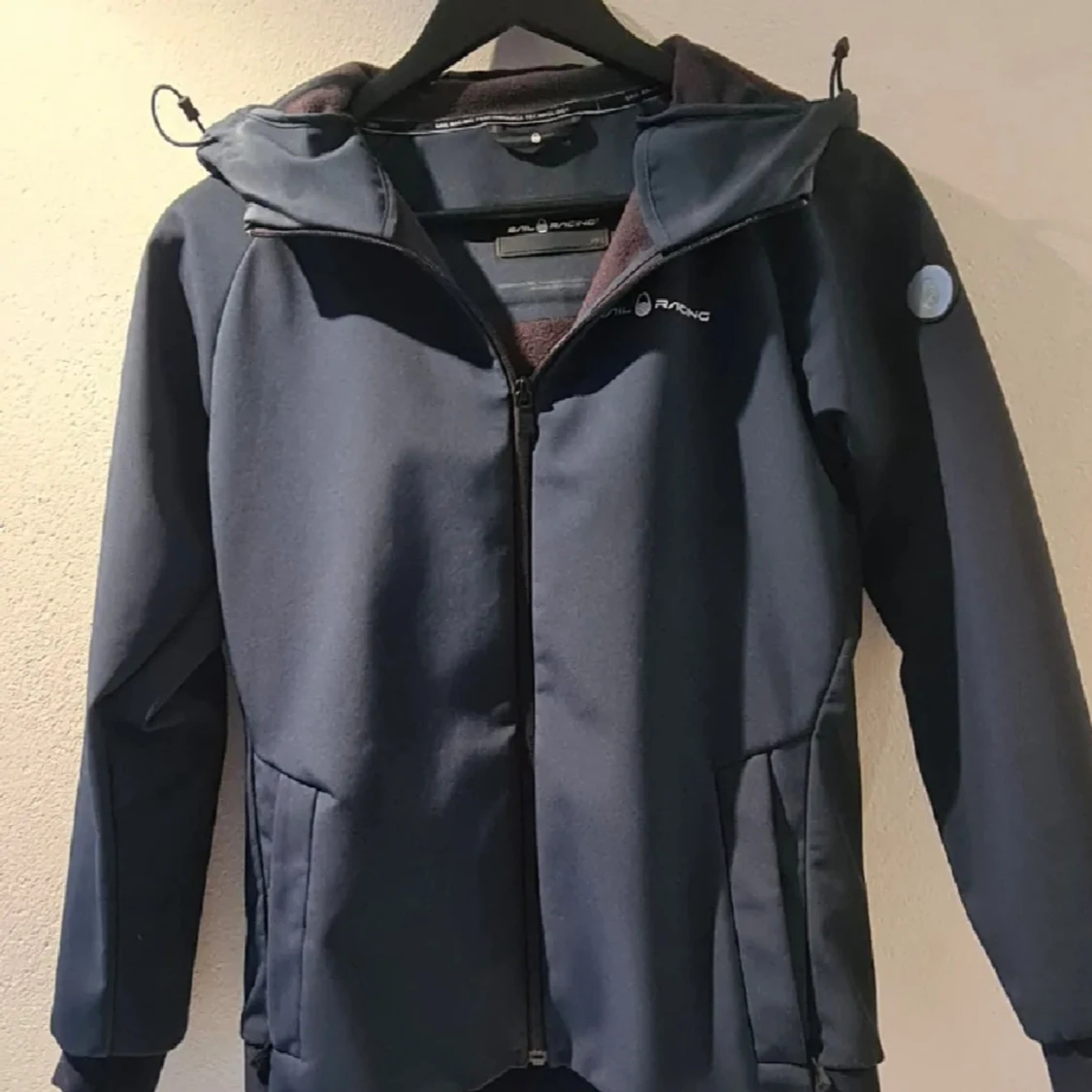 Mörkblå sail racing jr bowman softshell hoodie jacket