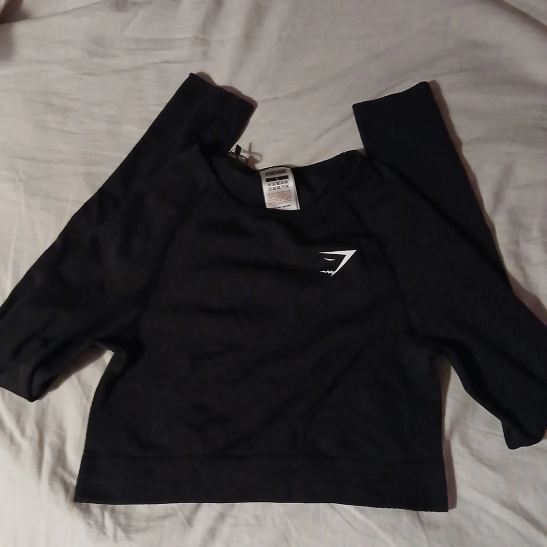 Svart långärmad crop top från Gymshark