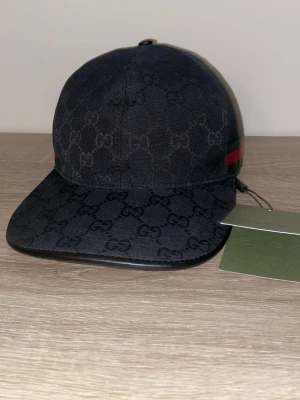 Svart Gucci keps - Helt ny oanvänd Gucci keps.